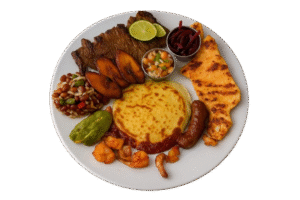 Colorful traditional Salvadoran platter with grilled beef, chicken fillet, sweet plantains, pupusa, chorizo, shrimp, pickled cabbage, beans, avocado, and fresh salad, all served on a white plate in individual portions.