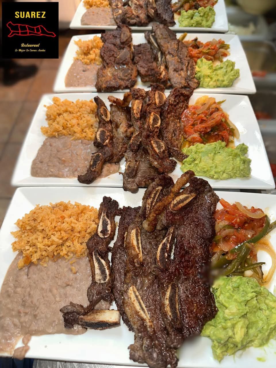 Assorted Salvadoran dishes including handmade pupusas, tamales, fried yuca, and plantains served fresh at Pupusería Patty’s