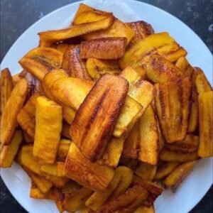 Assorted Salvadoran dishes including handmade pupusas, tamales, fried yuca, and plantains served fresh at Pupusería Patty’s